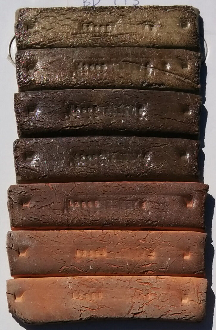 Fired bentonite test bars are dark brown