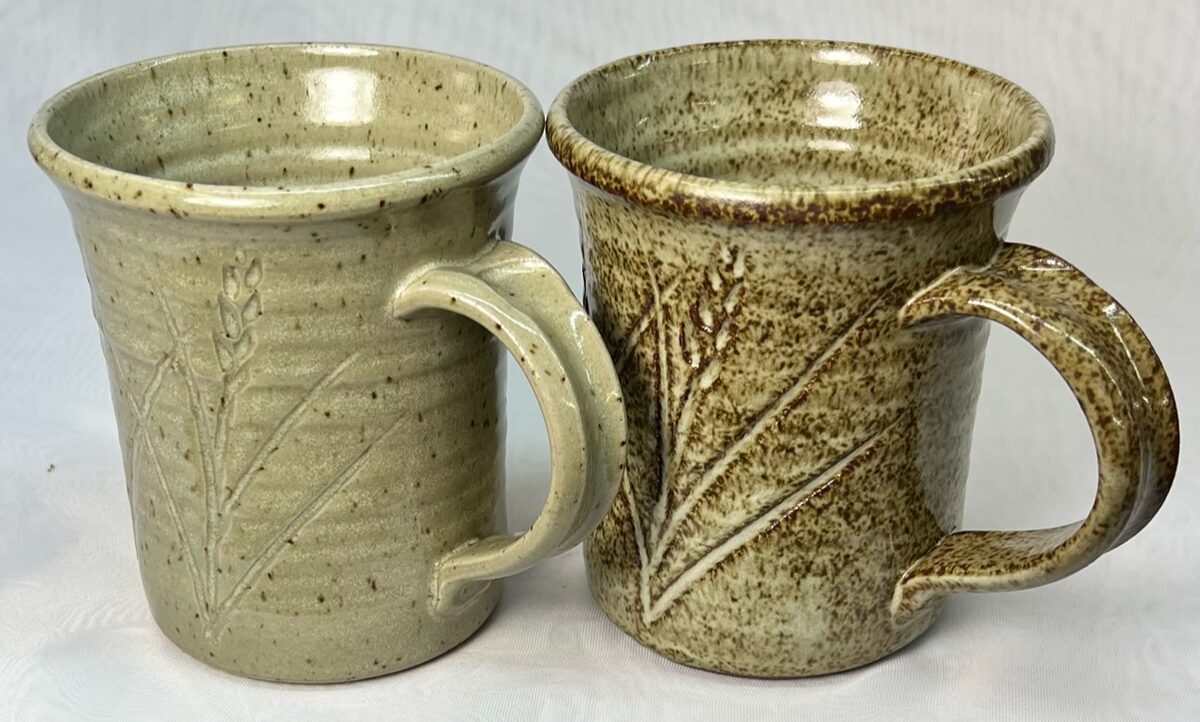 Heavily speckled reduction fired mug
