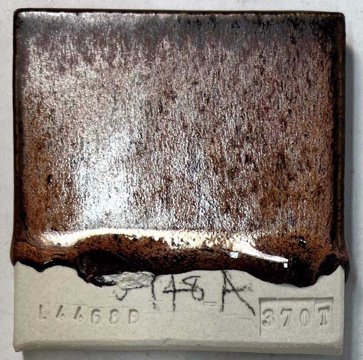 A runny pottery glaze