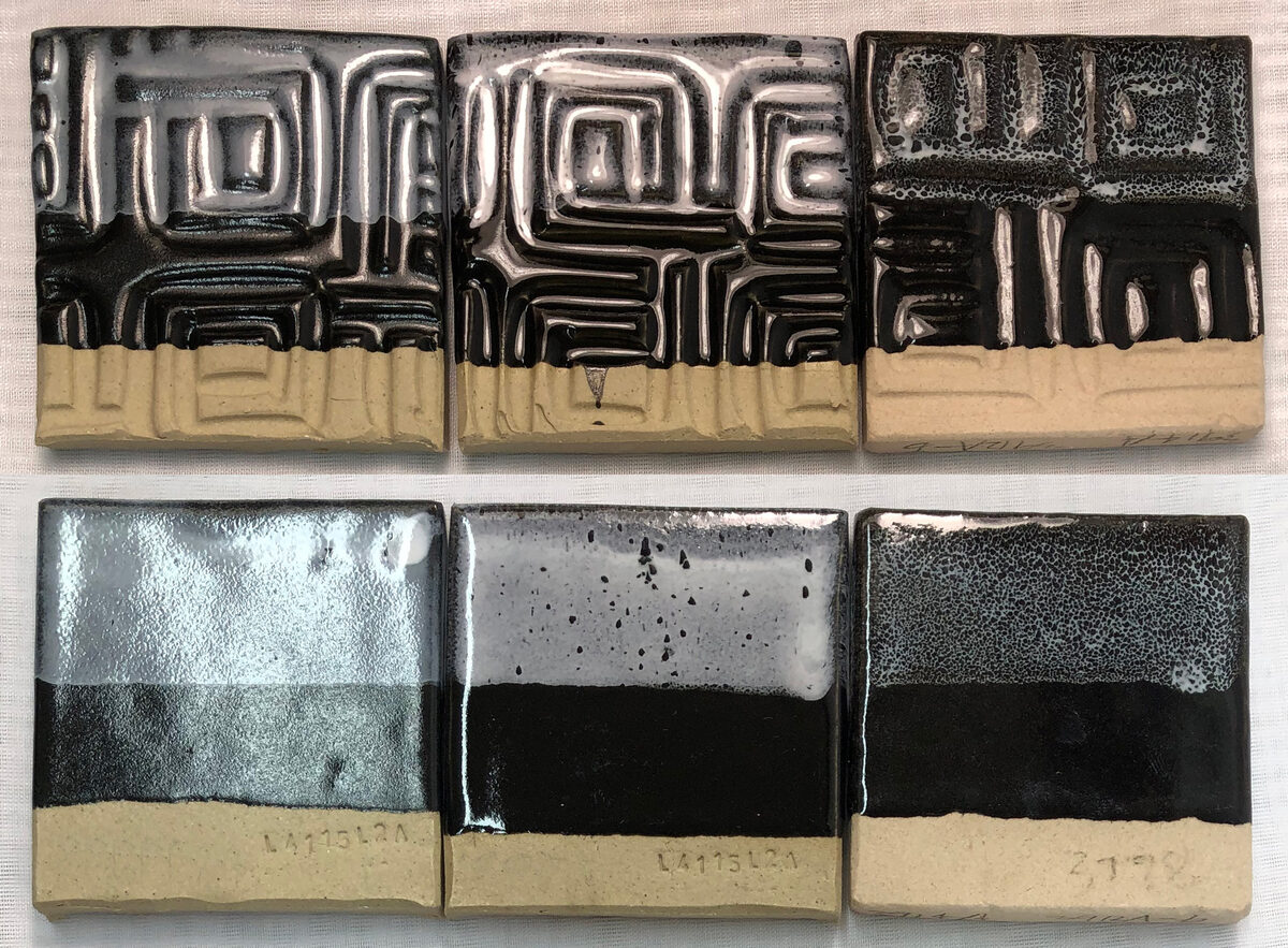 Cone 6 glazed tiles of white-on-black oil spot glazes
