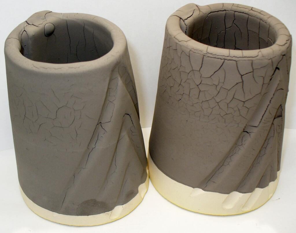 A high clay glaze is cracking