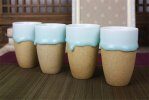 thick glaze drips on ceramic vessels
