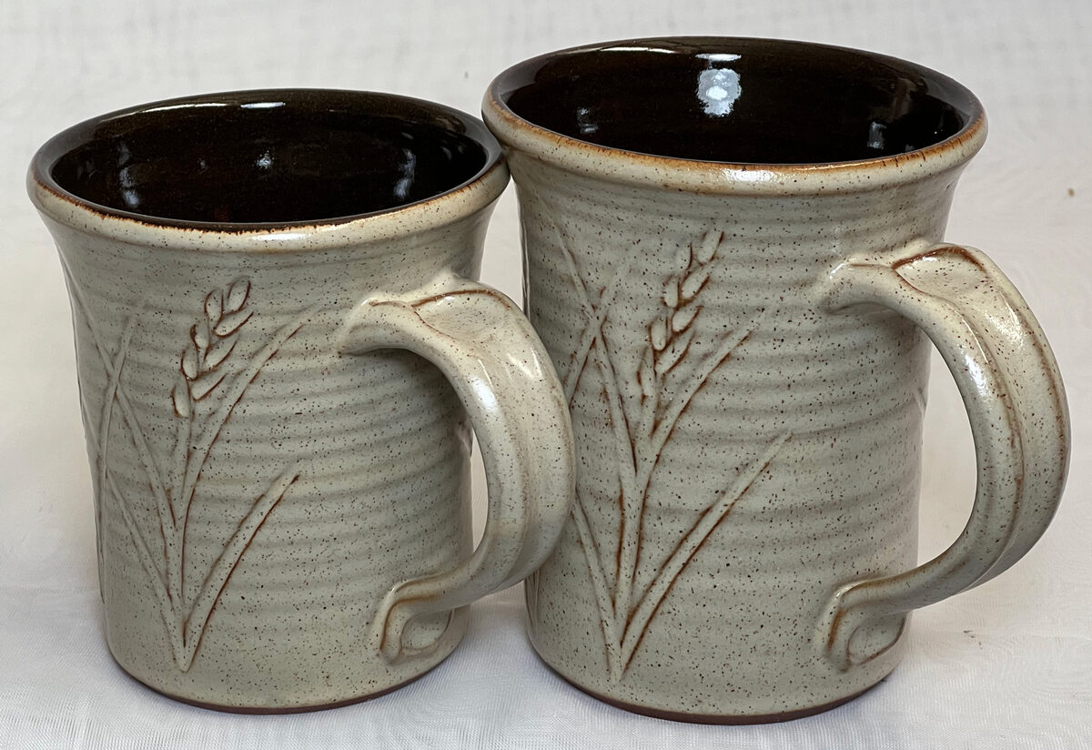 Two oatmeal glazed cone 6 mugs