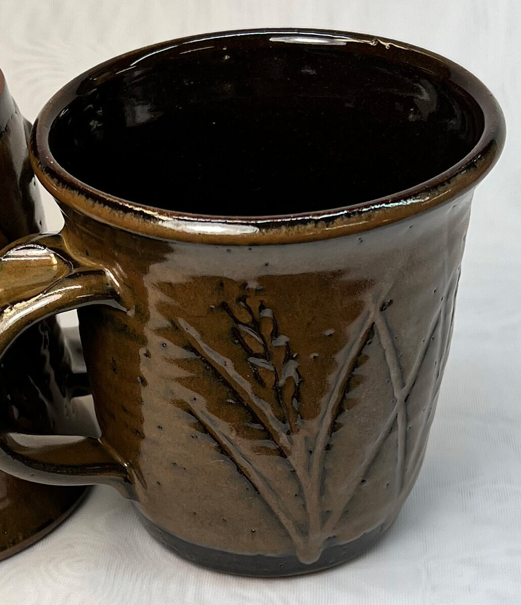 Glaze pinholing on a pottery mug