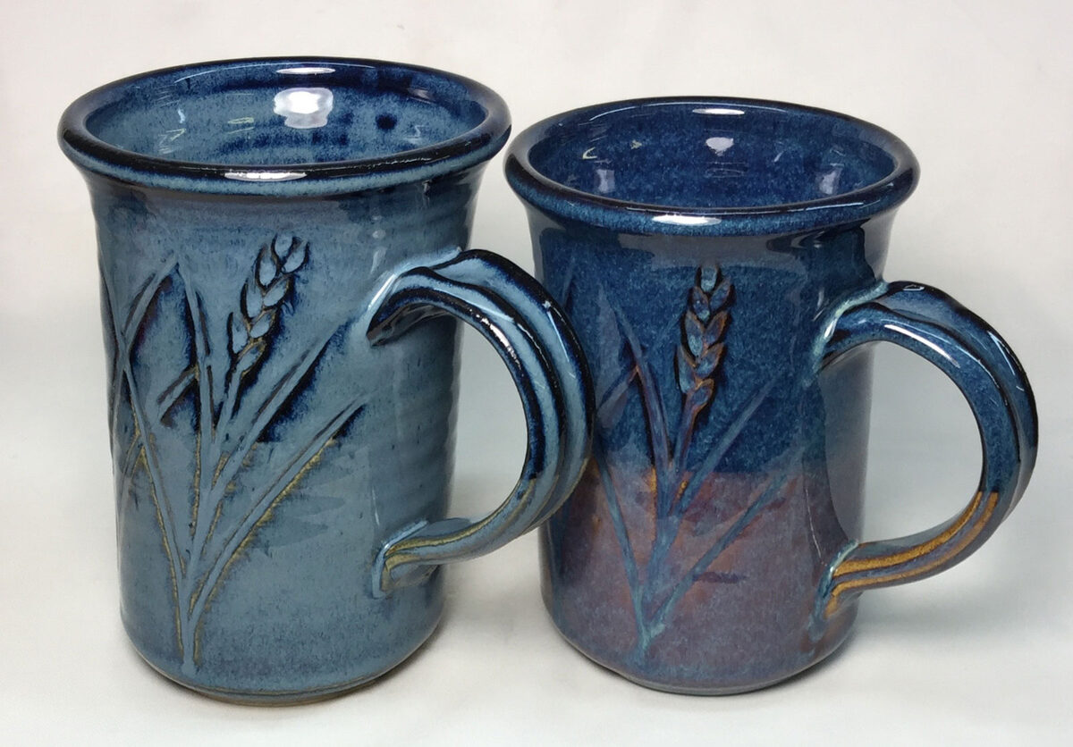 Two floating blue mugs