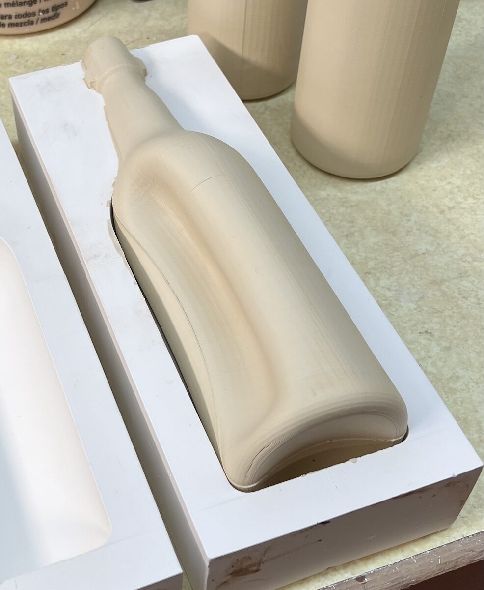 Slip casting bottle turning inside out