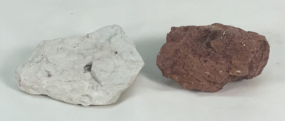 Two lumps of raw clay dug straight out of a hill Two lumps of raw clay dug straight out of a hill