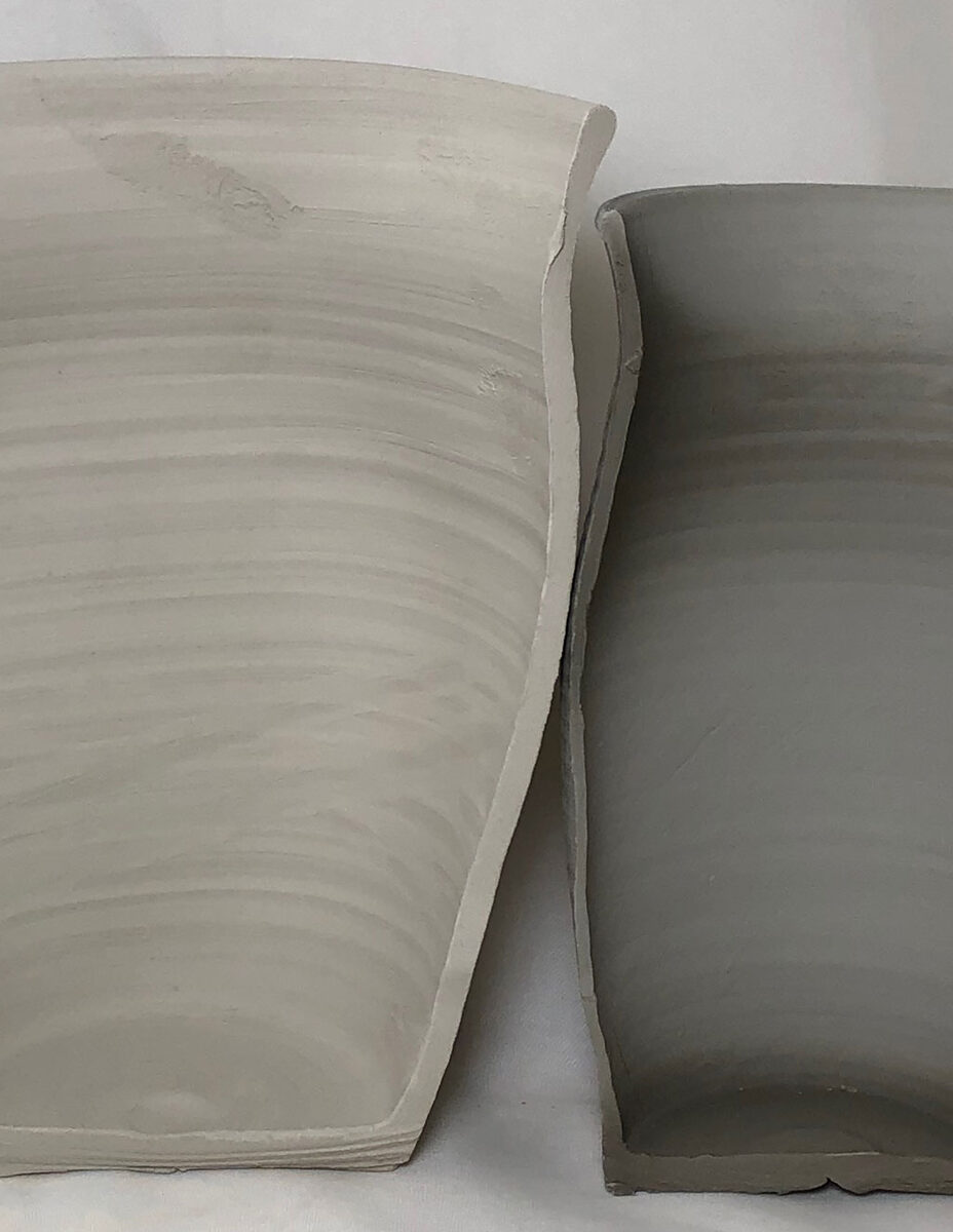 Two dissected vases showing the comparison in wall thickness