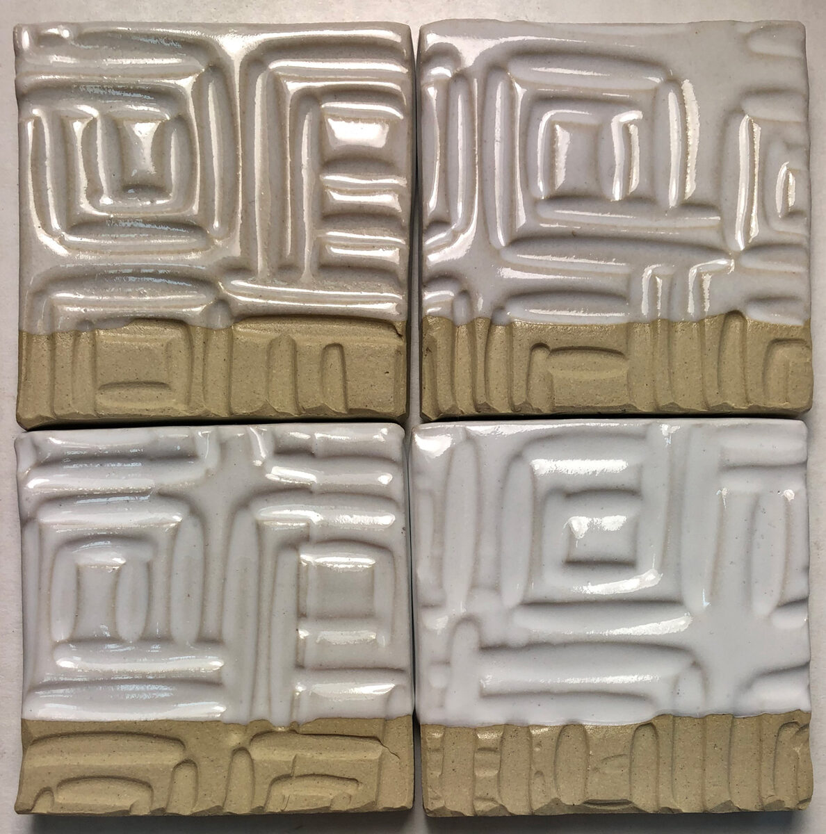 Gazed test tiles have 4, 5, 6, 7% tin oxide opacifier