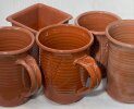 Boron and lead transparent glazes on terra cotta