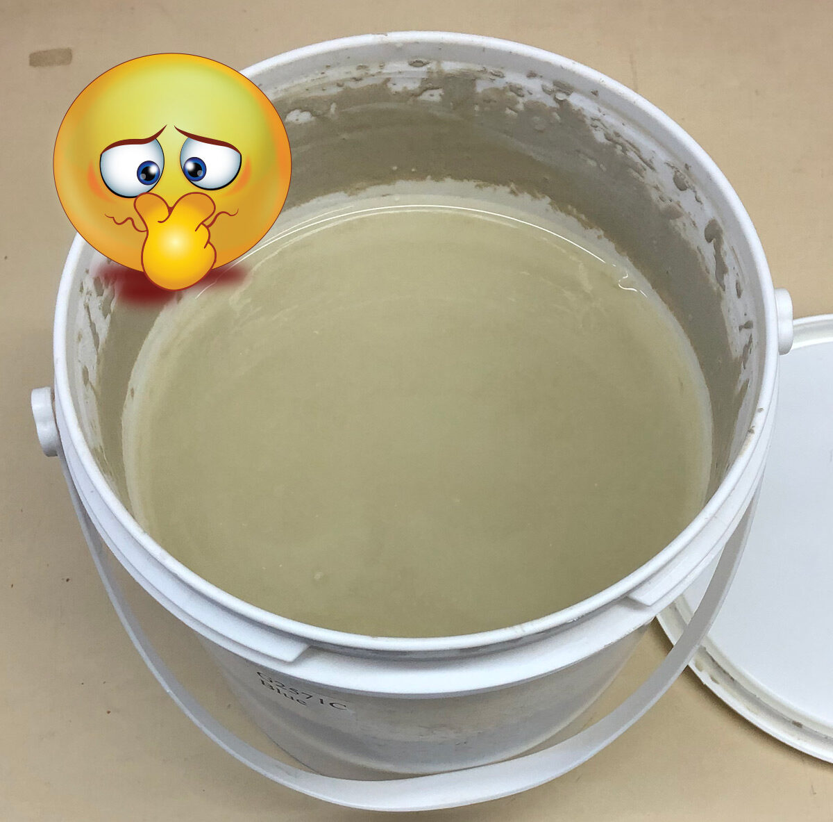 A bucket of glaze slurry that smells really bad