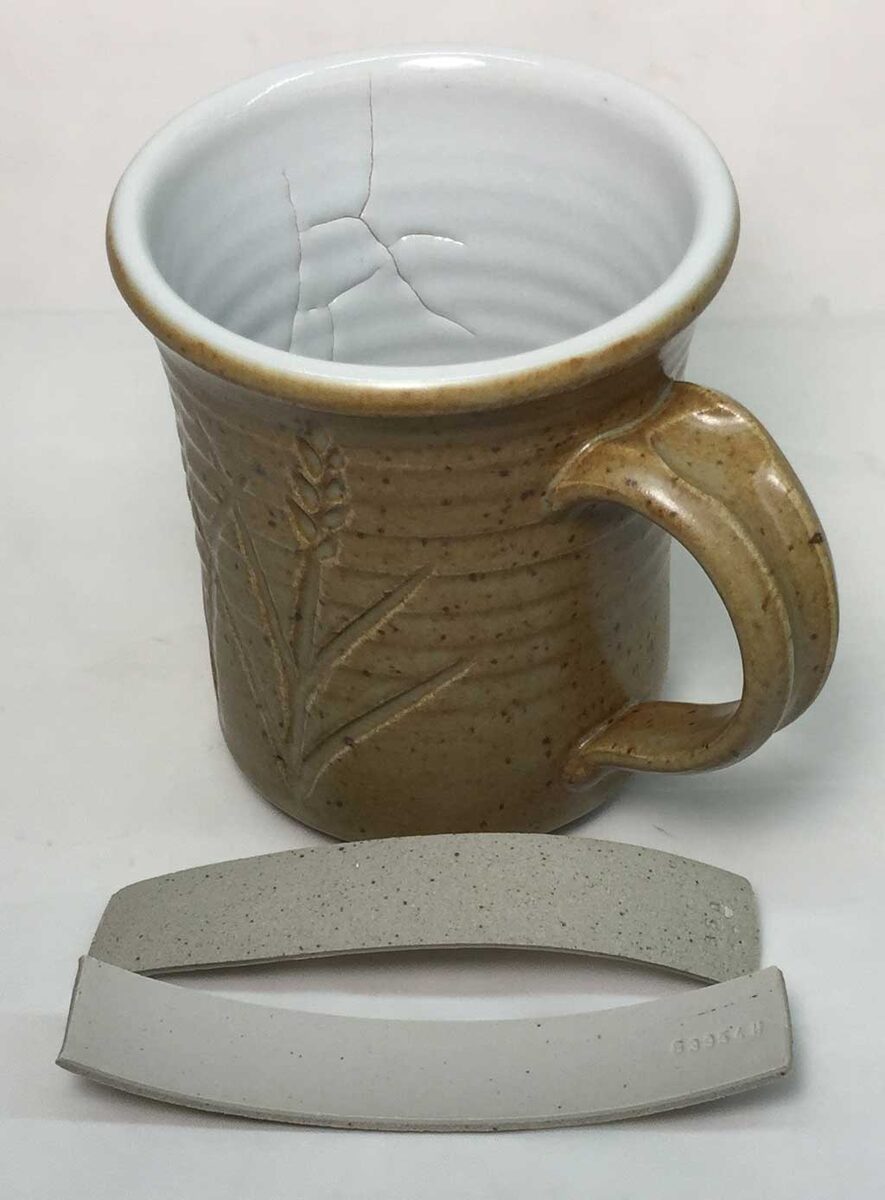 Engobe misfit crack pattern inside a mug