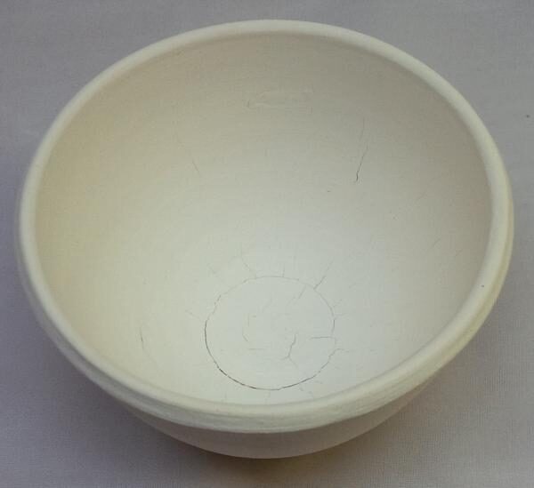 A small bowl thrown from pure kaolin