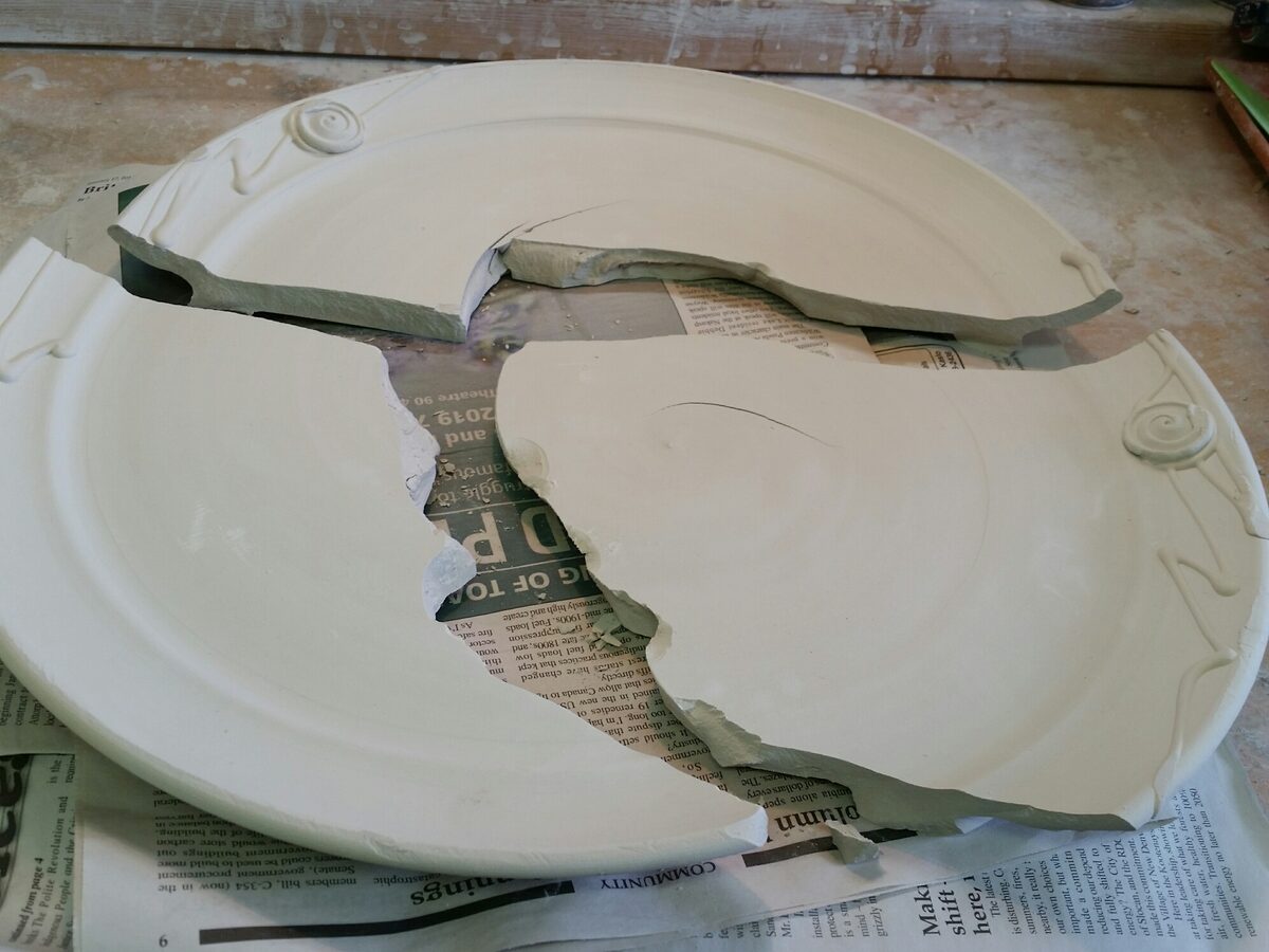 A large plate cracked in drying