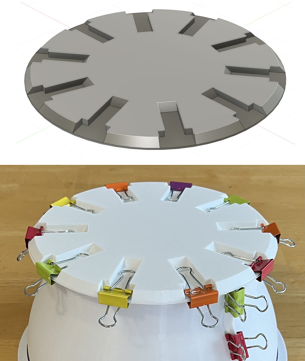 3D printed mold held together with paper clamps