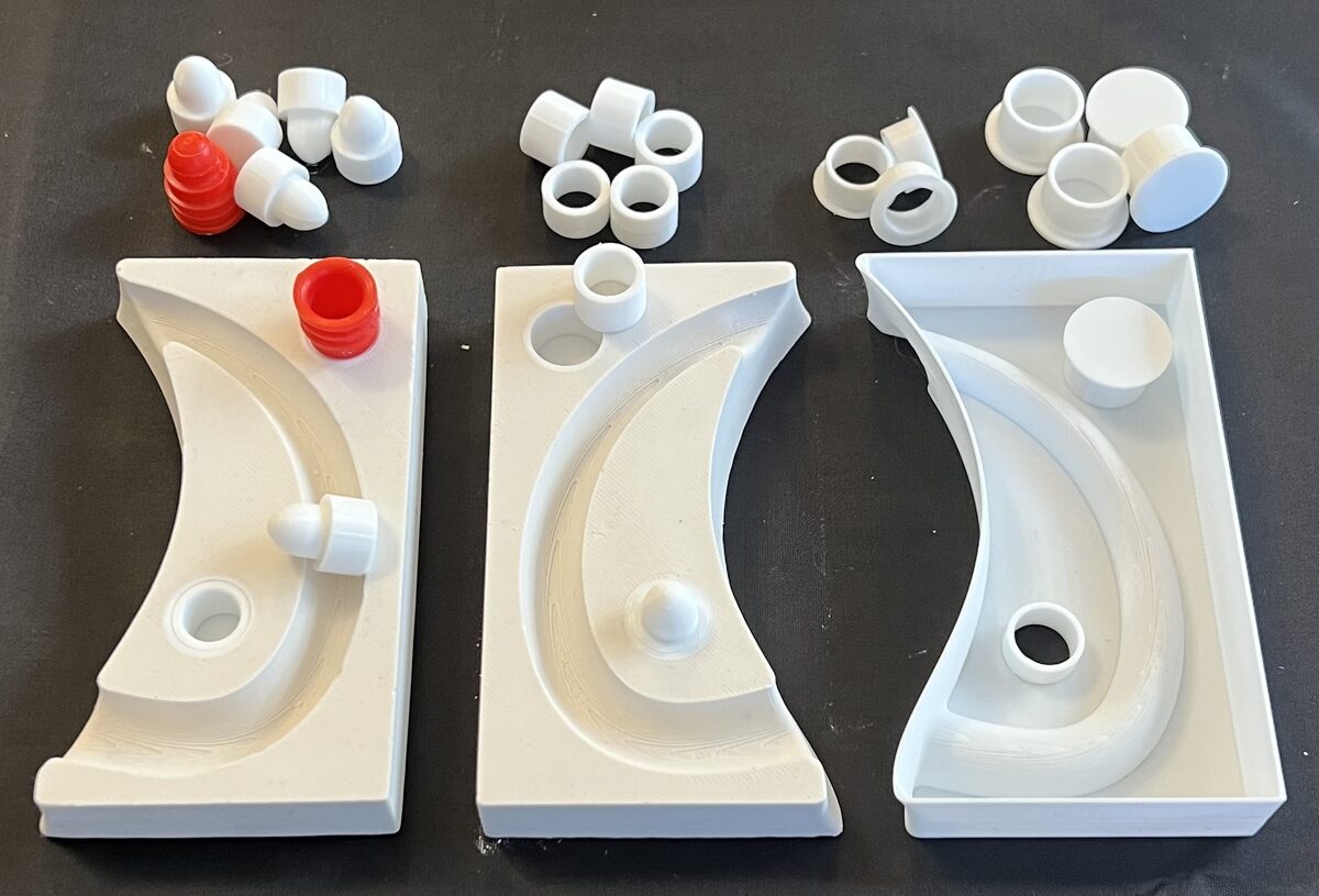 Natches, spacers, embeds in a plaster handle mold