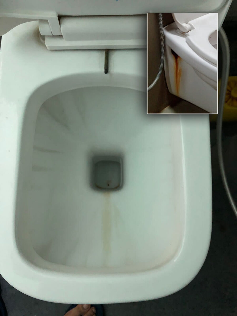 Staining of sanitaryware glazes