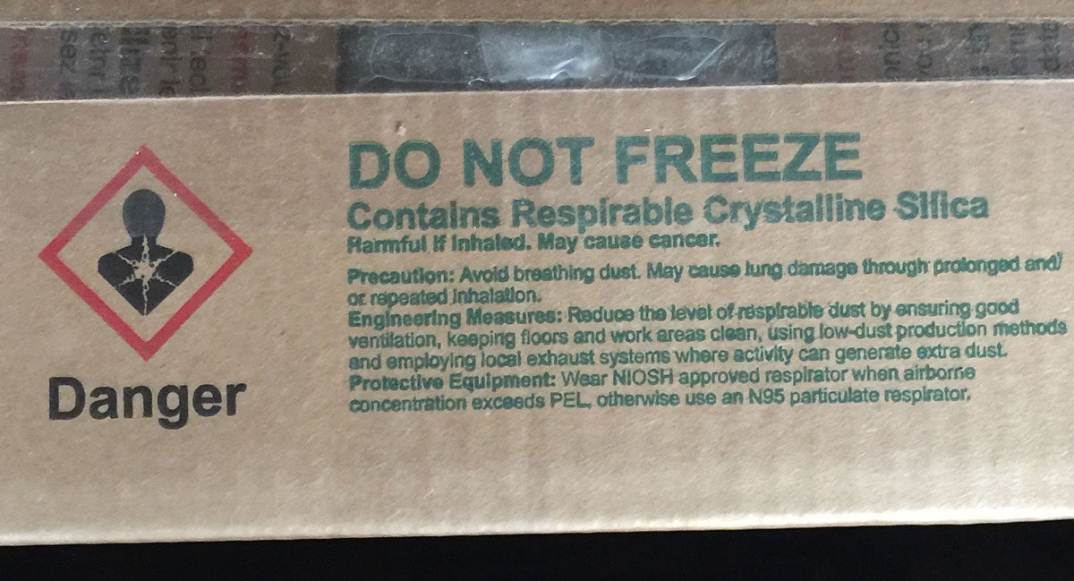 Crystalline silica warning on a box of clay