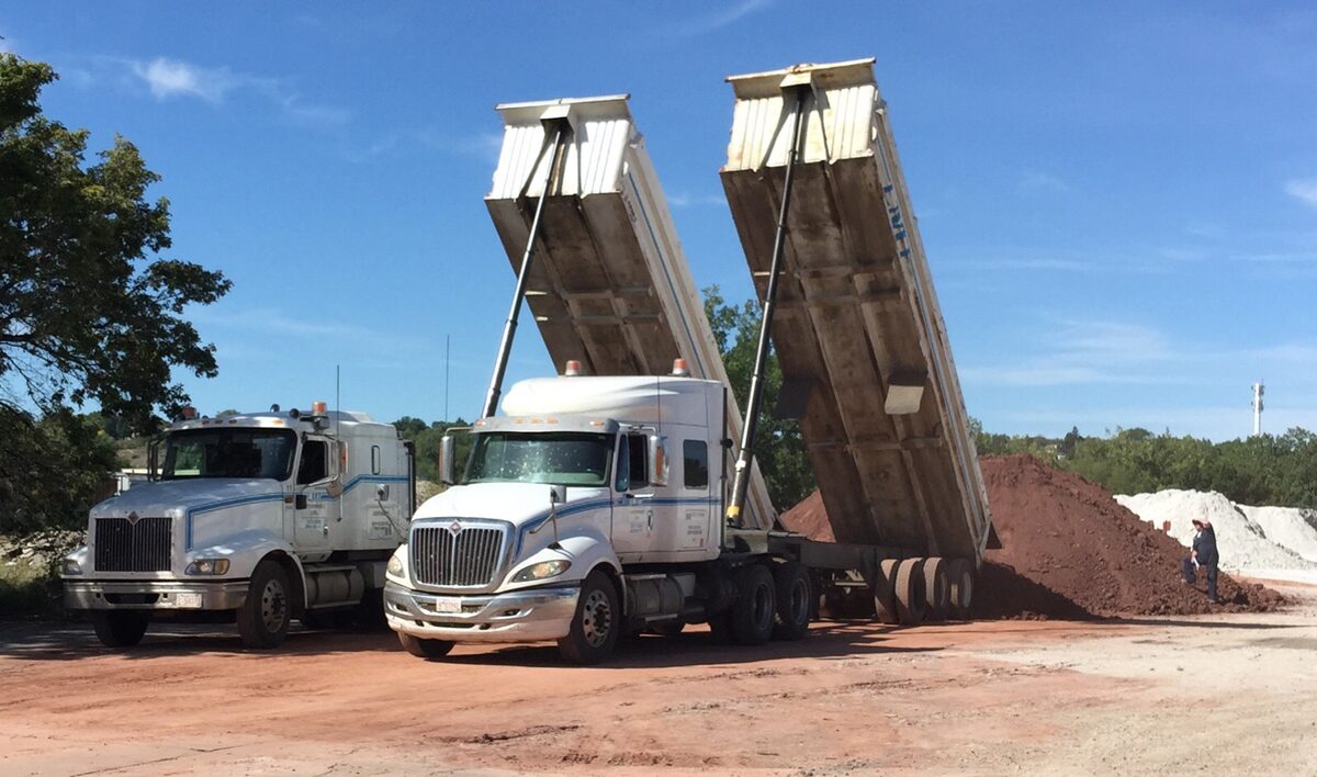 M2 clay being delivered to Plainsman Clays M2 clay being delivered to Plainsman Clays By tandem dump