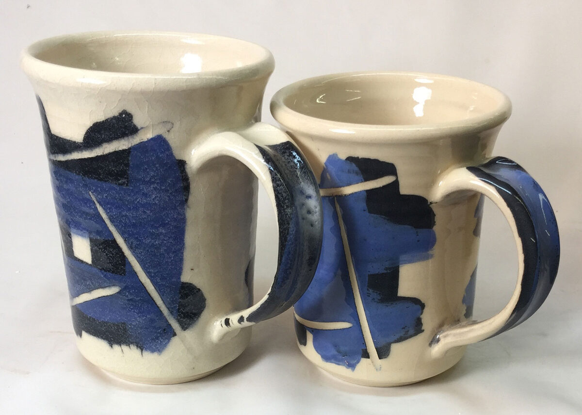Two mugs with clear glazes
