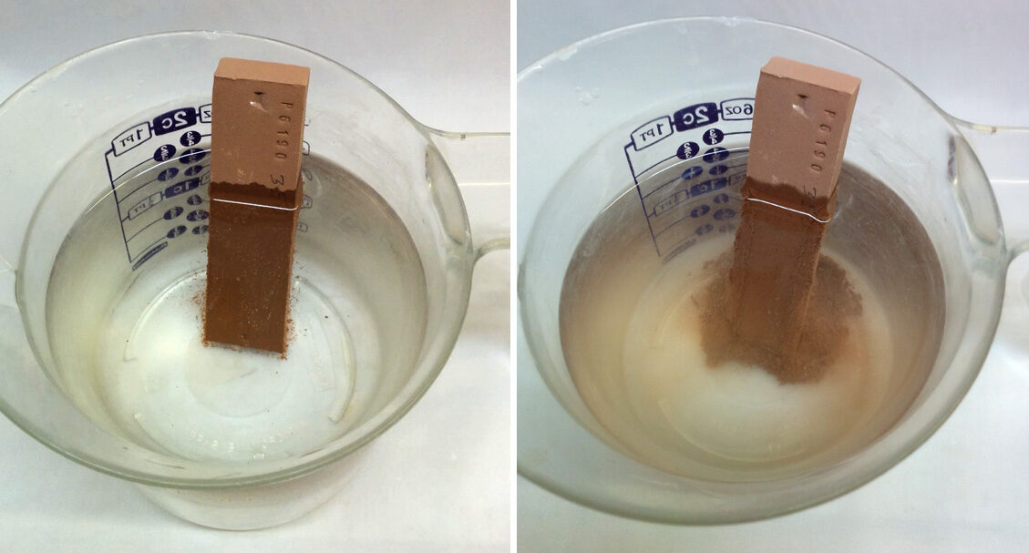 A clay bar is immersed in a cup of water and slaking. A clay bar is immersed in a cup of water and slaking.
