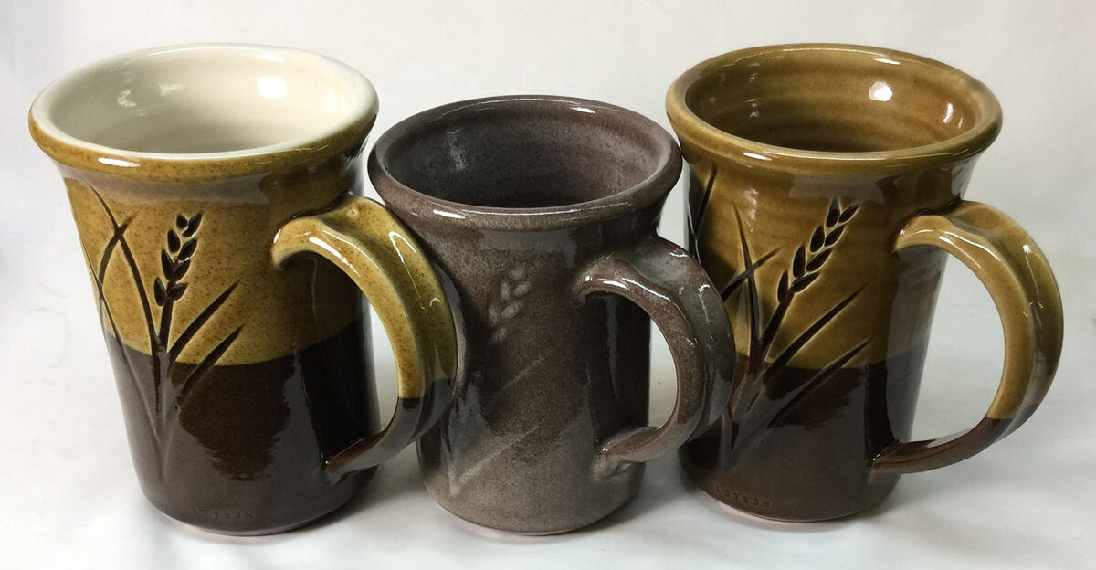 Cloudy clear glaze on dark body