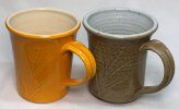 Artware and stoneware pottery mugs